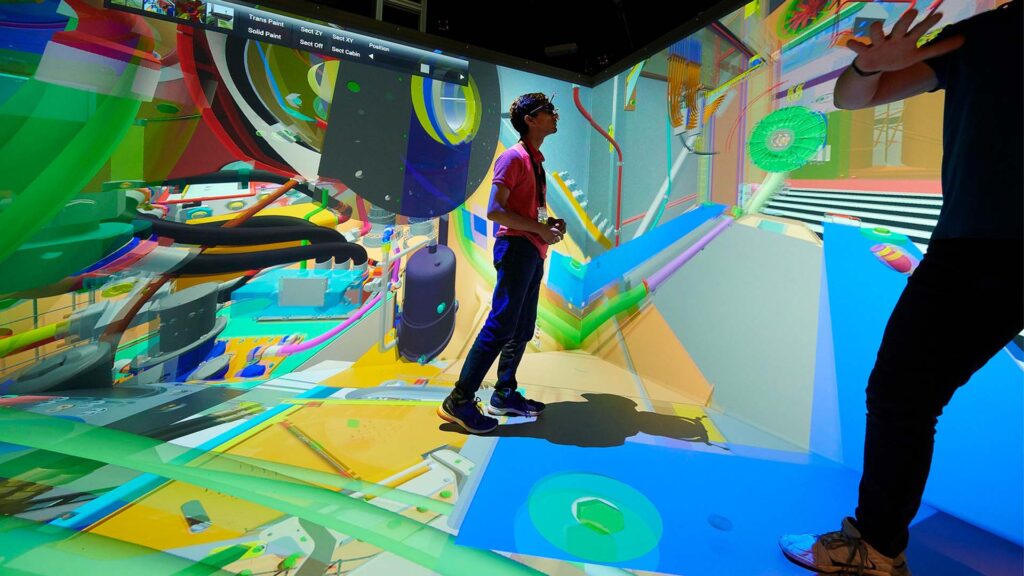 Students use VR in the CAVE, Tech Hub.